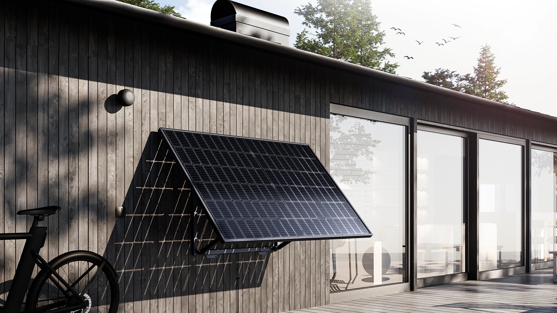 Panneau solaire photovoltaïque plug and play avec batterie fixé au mur sur maison moderne vue de trois quart de la marque Sunology PLAYMax